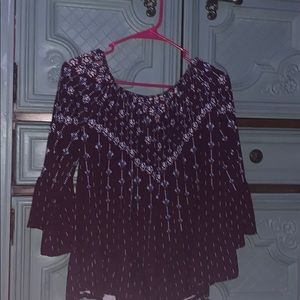 Purple off the shoulder long sleeved shirt